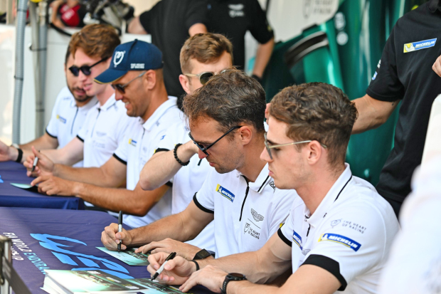 <p>Above, WEC drivers sign memorabilia during the autograph session.</p>
